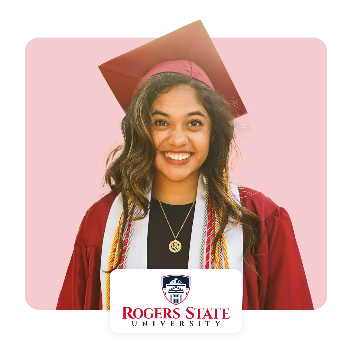 Smiling graduate wearing a cap and gown from Rogers State University.