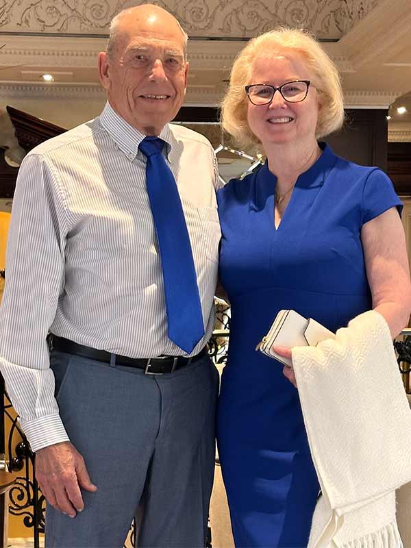 Couple matching in royal blue on a cruise