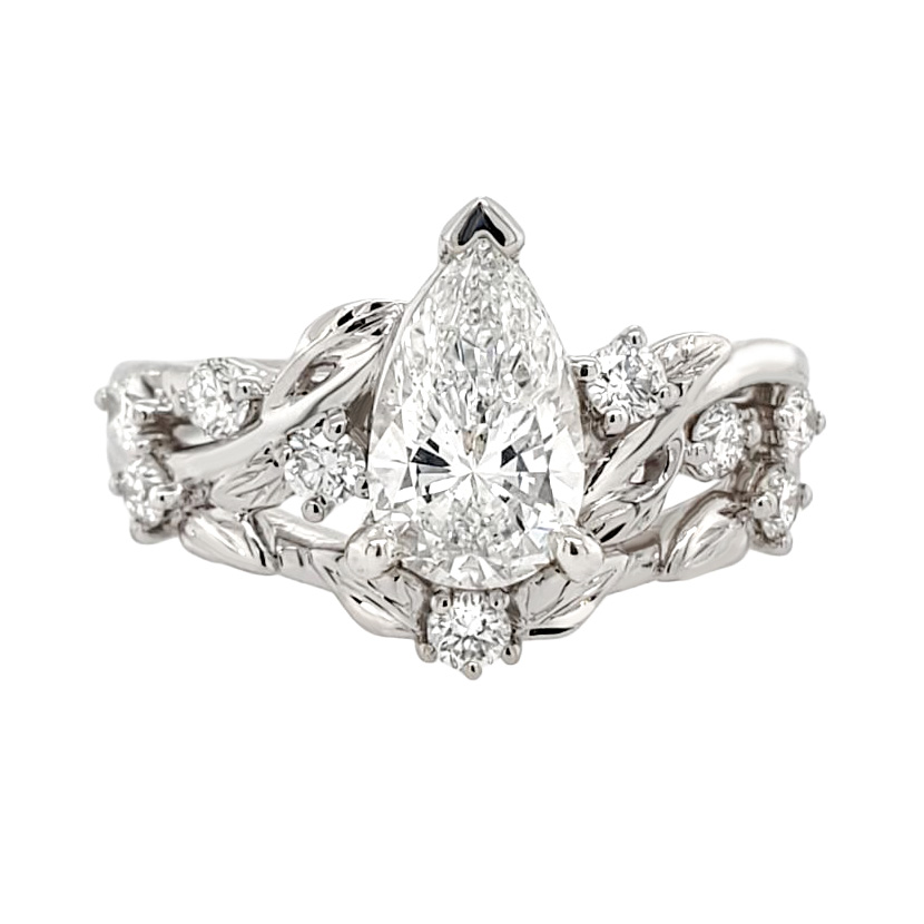 custom carved pear diamond engagement ring