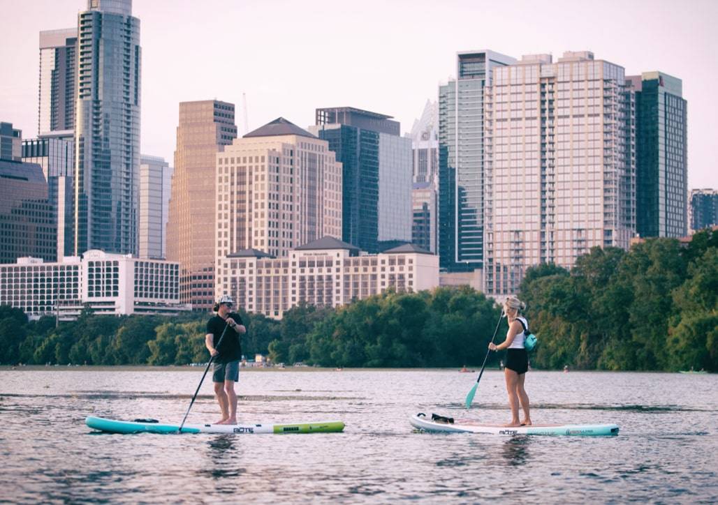 Paddle boarding with Austin, TX skyline