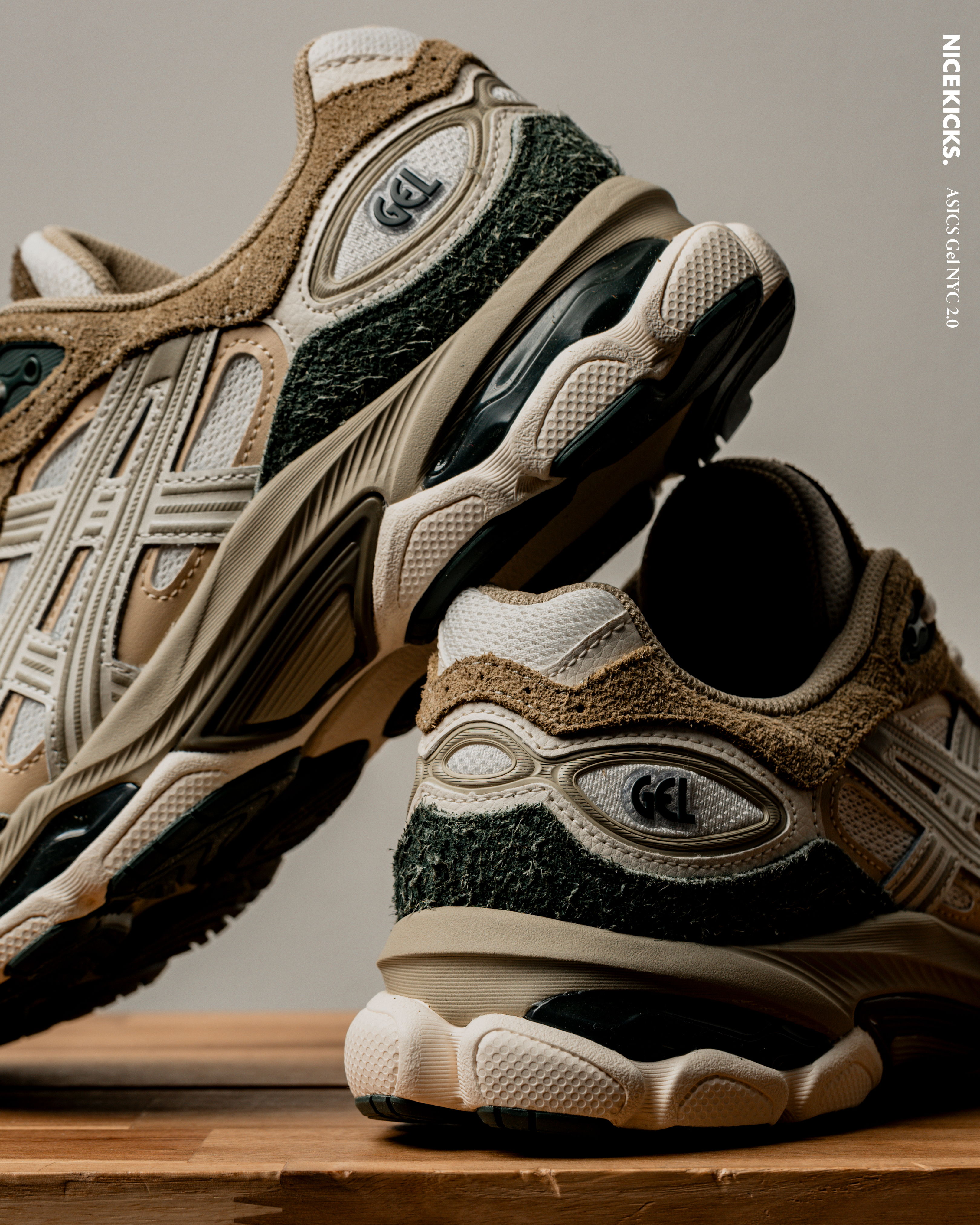 A pair of stylish sneakers displayed on a wooden surface.