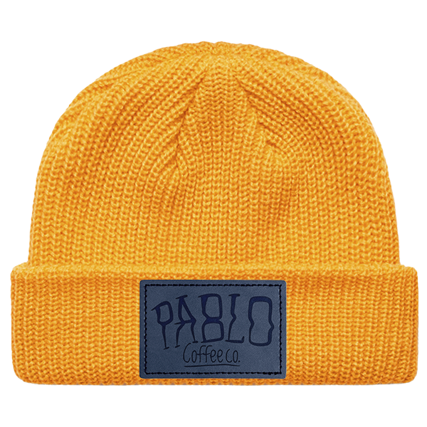 Gold Yellow cable beanie with blue 'pablo coffee co' leather patch on cuff