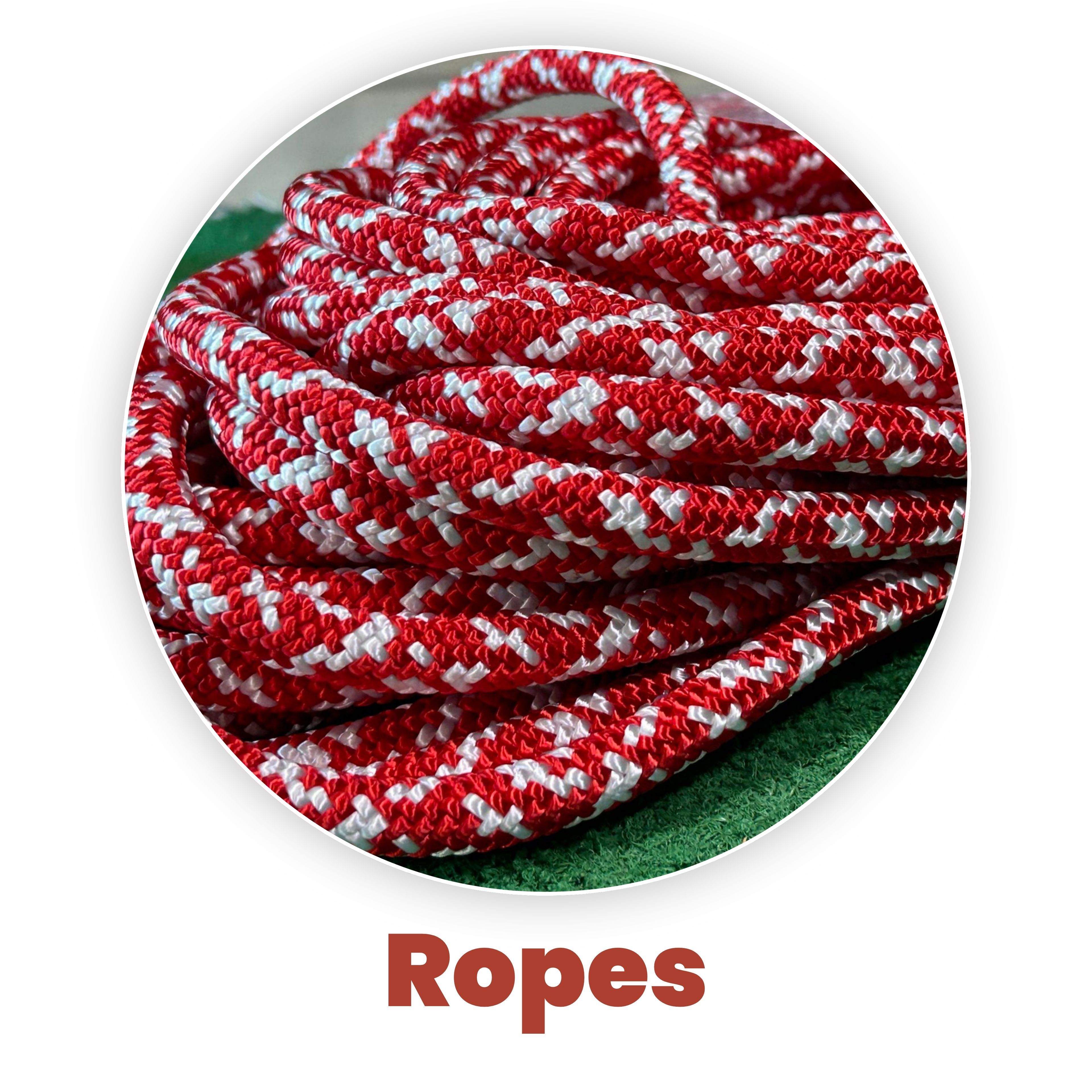 Red and white patterned ropes arranged in a circular layout.