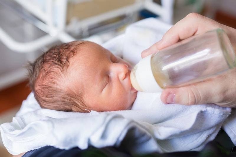 baby drinking from baby bottles for newborn