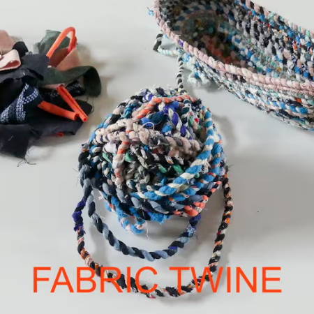 A ball of fabric twine made out of fabric scraps