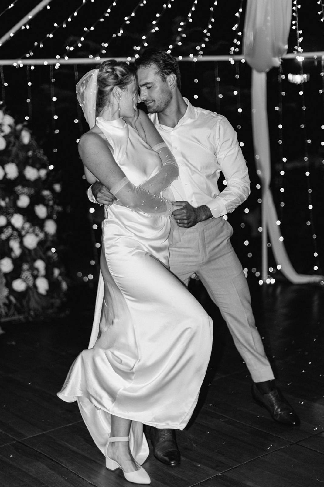 Bride and groom dancing together