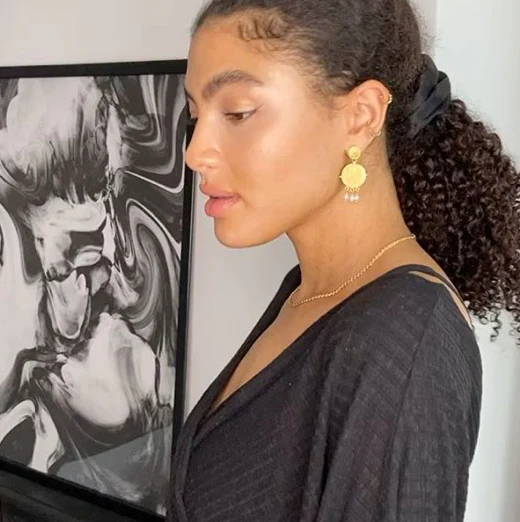 Samio Renelda wears Soru Jewellery  gold coin and pearl earrings 