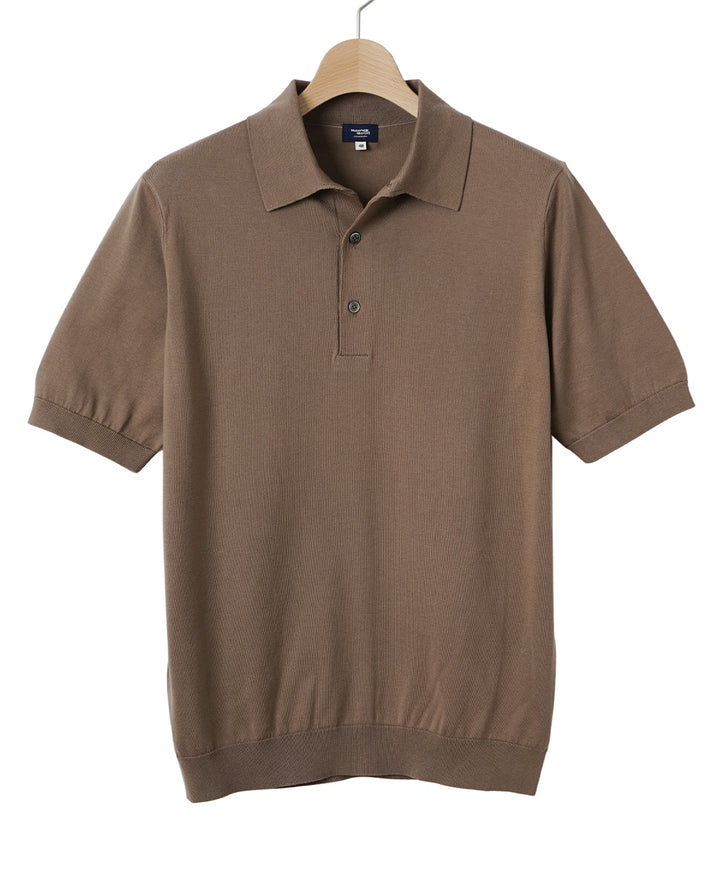 Brown short-sleeve polo shirt hanging on a wooden hanger.