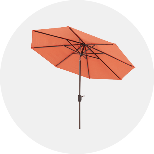 Orange umbrella with a metal frame, set against a circular white background.