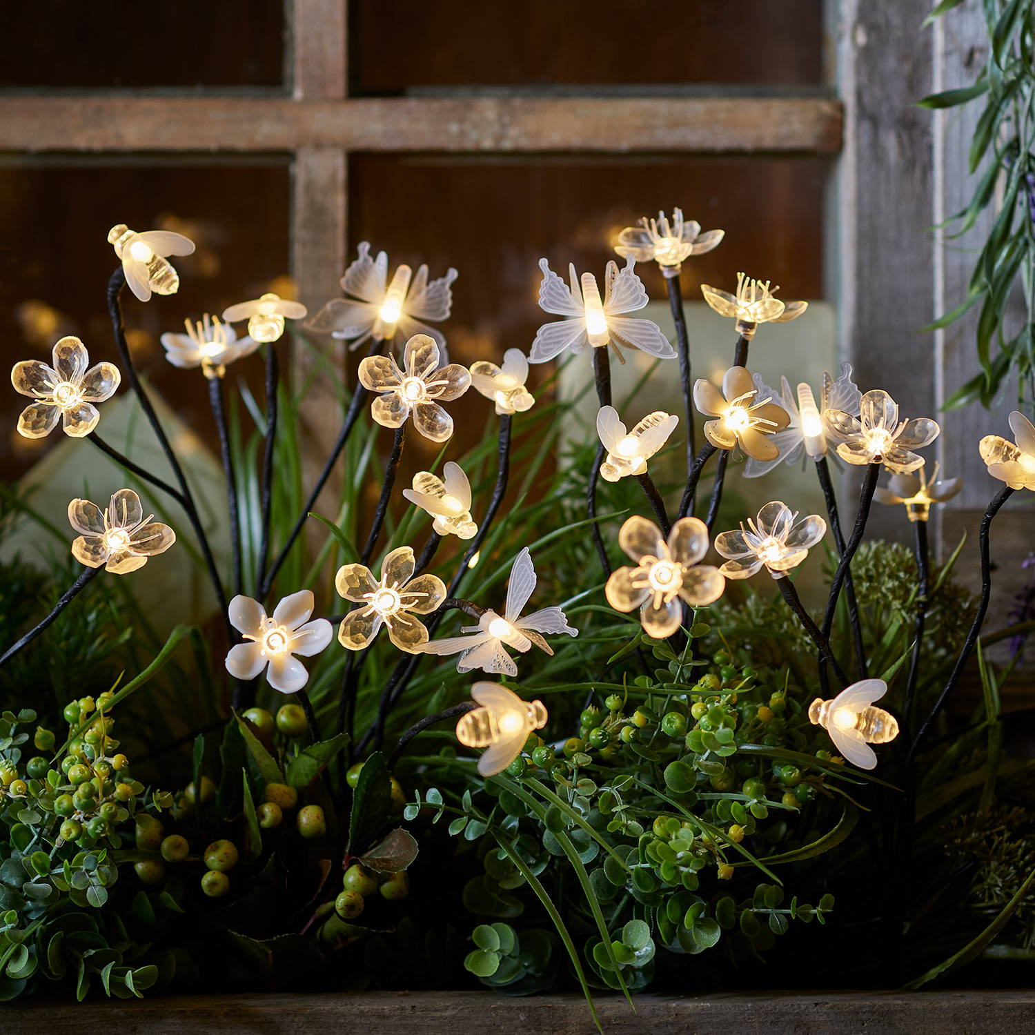 Plant trough featuring characteristic stake lights