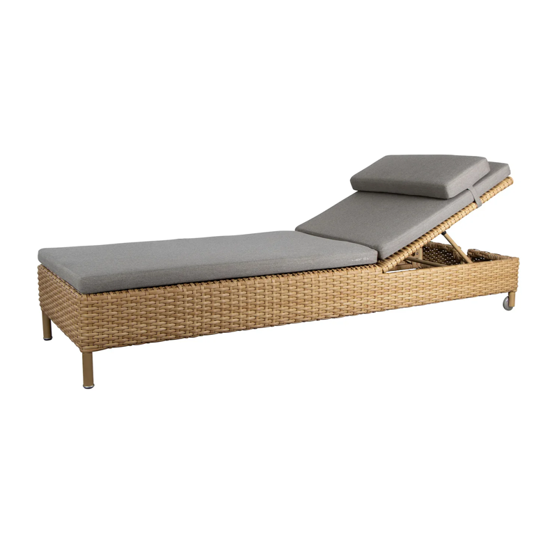 A chaise lounge that has a contemporary design featuring a durable aluminum frame and robust weather-resistant weave.