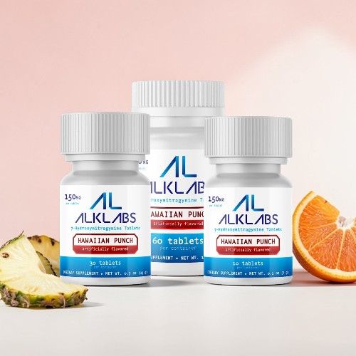 Three bottles of dietary supplements with fruit slices in the background.