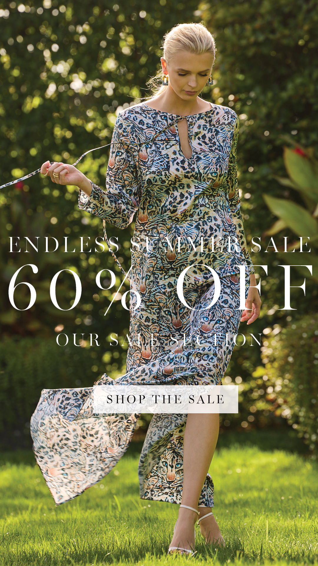 Woman in snow leopard dress with sale banner promoting 60% off.