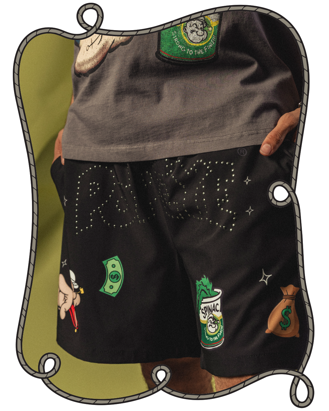 Person wearing black shorts with colorful patches and designs.