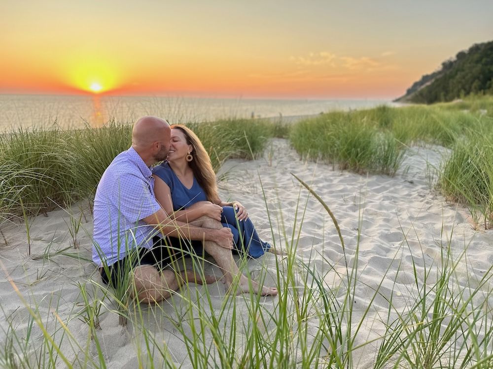 beach sunset frankfort michigan engagement proposal 