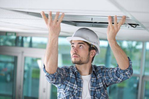 installing acoustic ceiling tiles