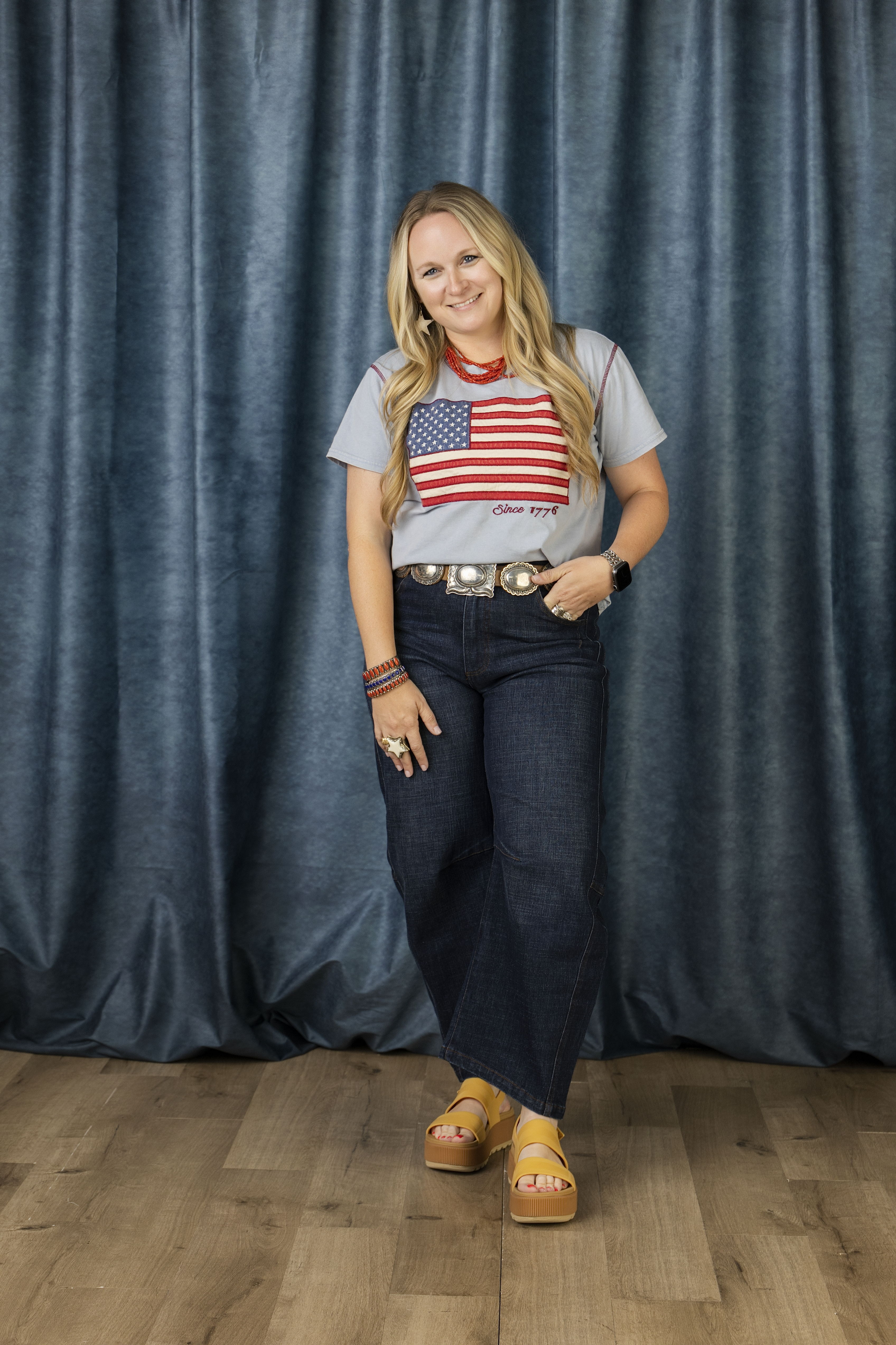 Leeann wearing the Voices of Liberty Top with the Boone Barrel Pants.
