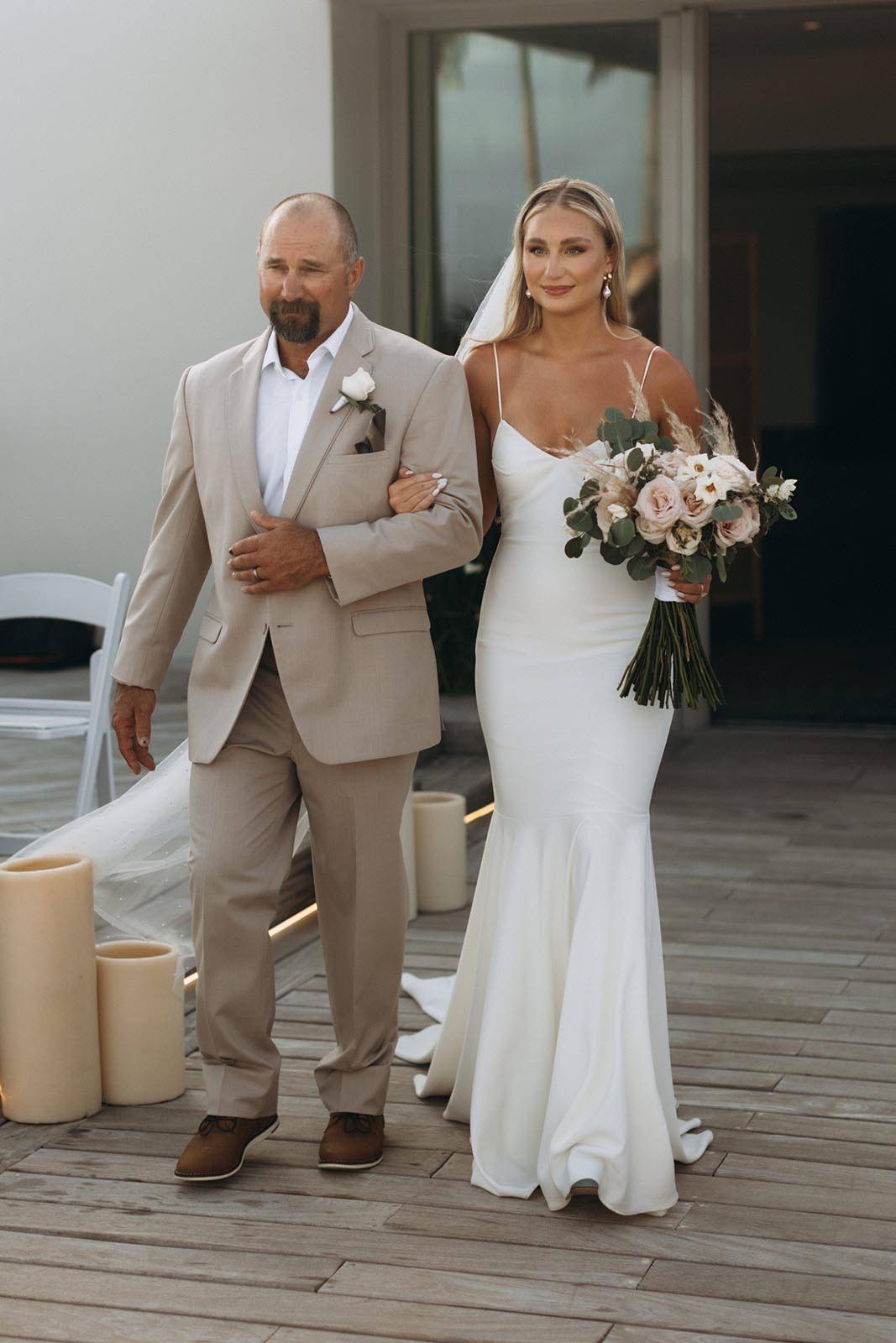 Bride, walking down the aisle with her father