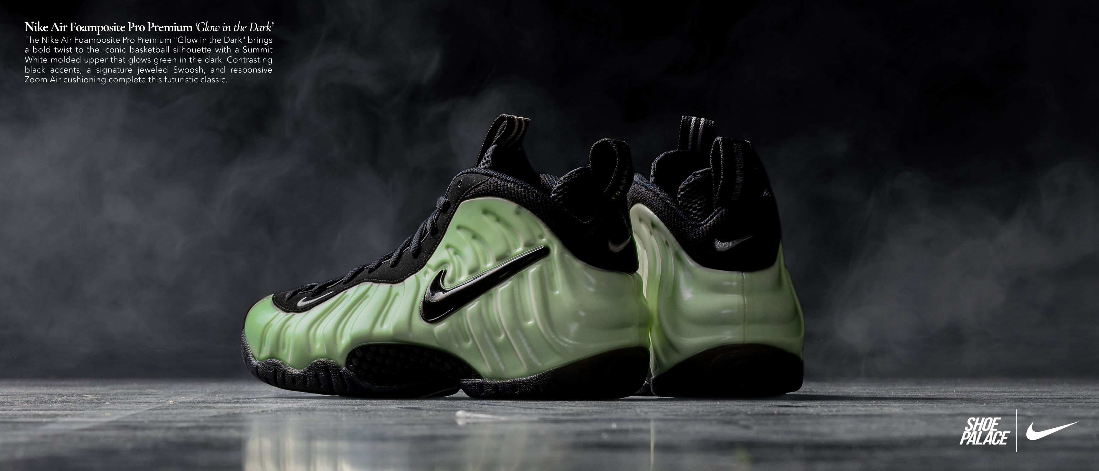 Nike shoes in black and green with a smoky background.