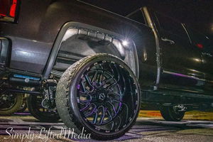 Side profile of 2016 GMC Sierra 1500 with Conductor's Special Spare Tire Delete train horn install HornBlasters gallery photo 2