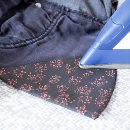 jeans’ pocket with new fabric piece, outside view, ironing the new seam flat