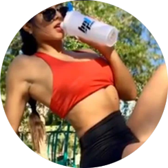 Photo of Maria Prieto posing drinking from BPI Sports shaker