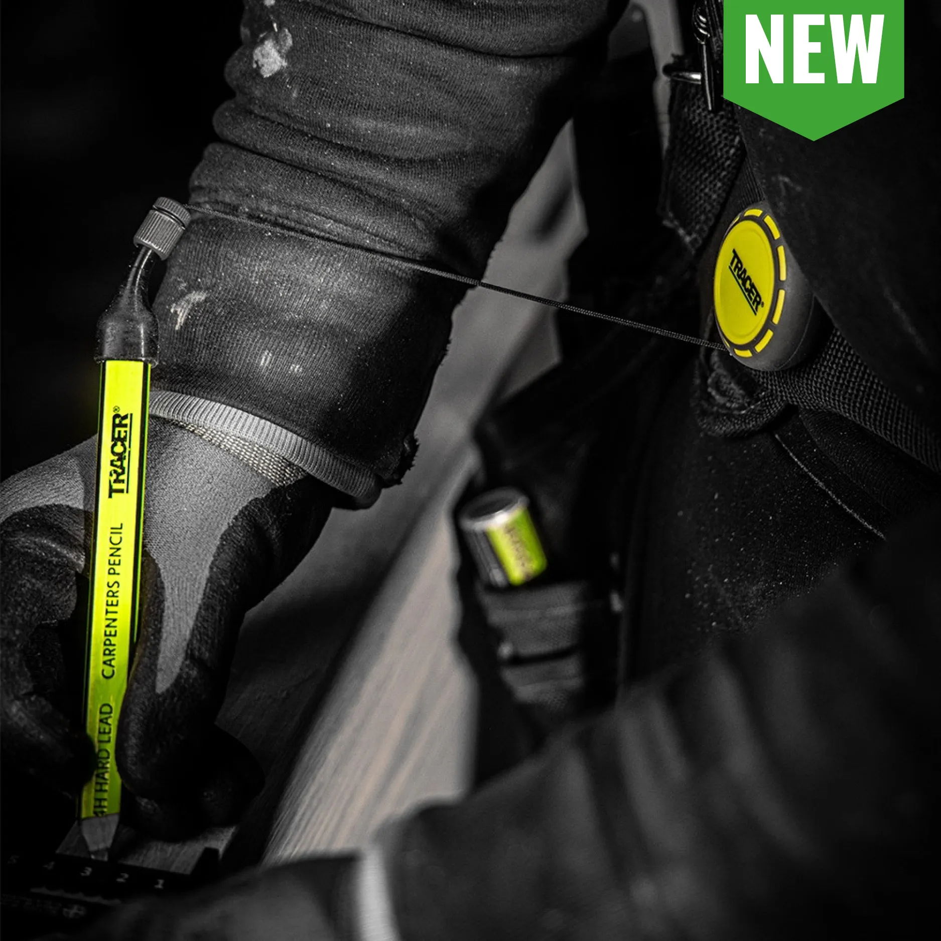 Person using a measuring tool with a new product label.