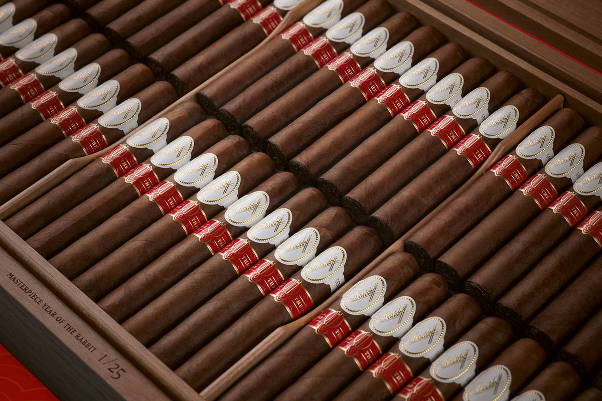 A close-up of the tray inside the Davidoff Year of the Dragon Masterpiece Humidor filled with gran toro cigars.