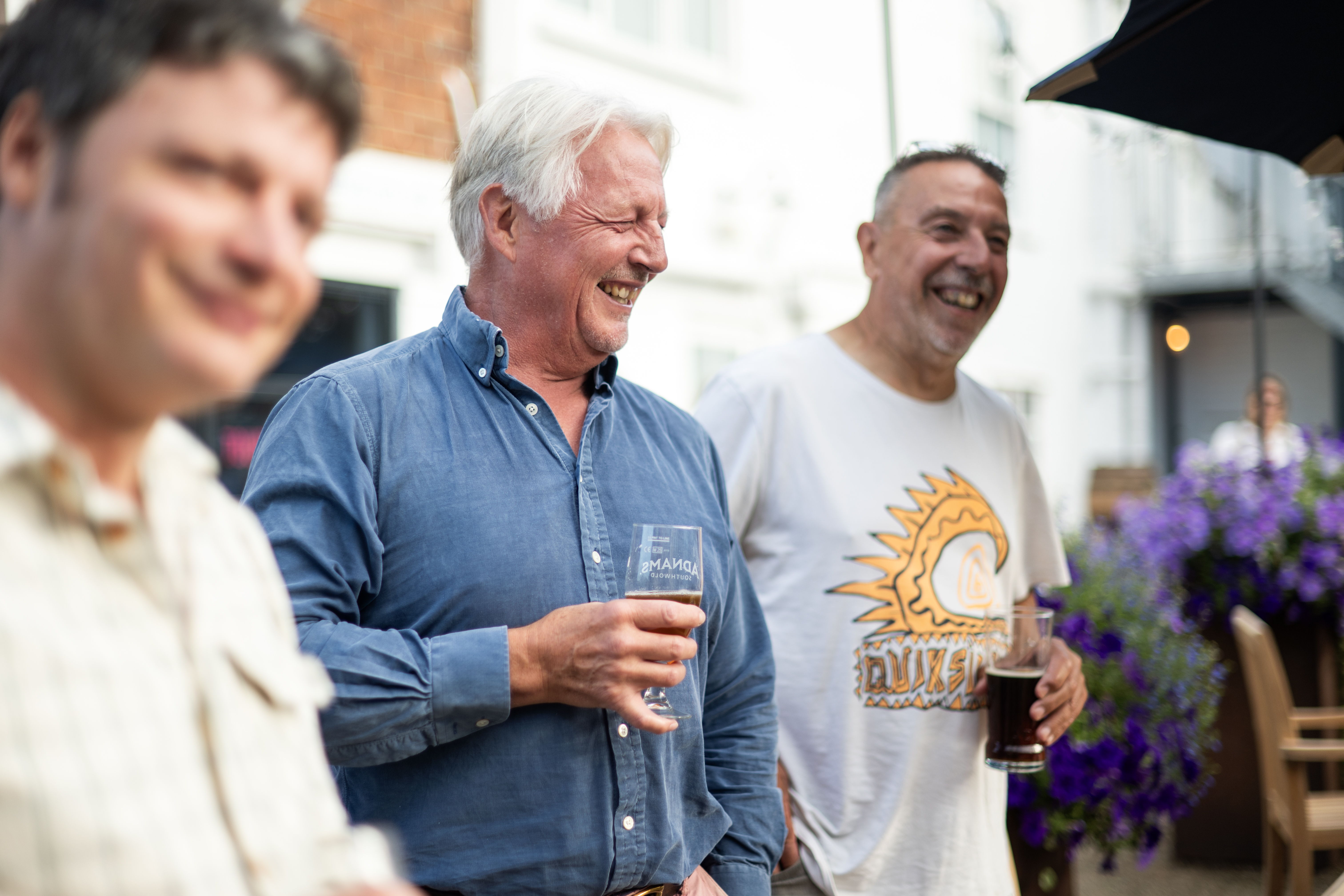 Mark Dorber, Adrian Tierney-Jones, and Dan Gooderham enjoying Adnams Extra at The Swan's Extra Special Beer BBQ Courtyard Session