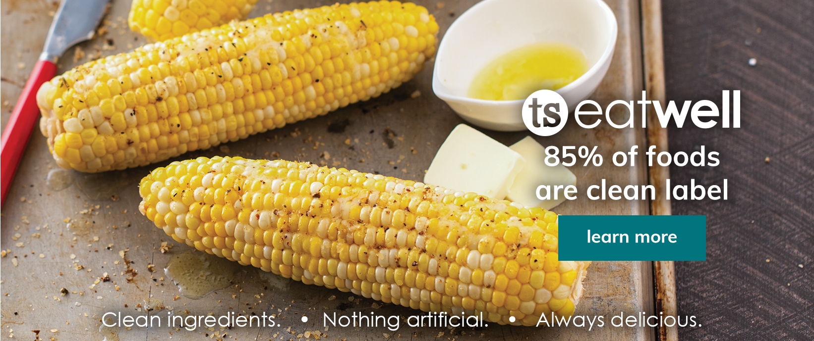 ts eatwell banner featuring corn on the cob and melted butter in a bowl with a learn more button
