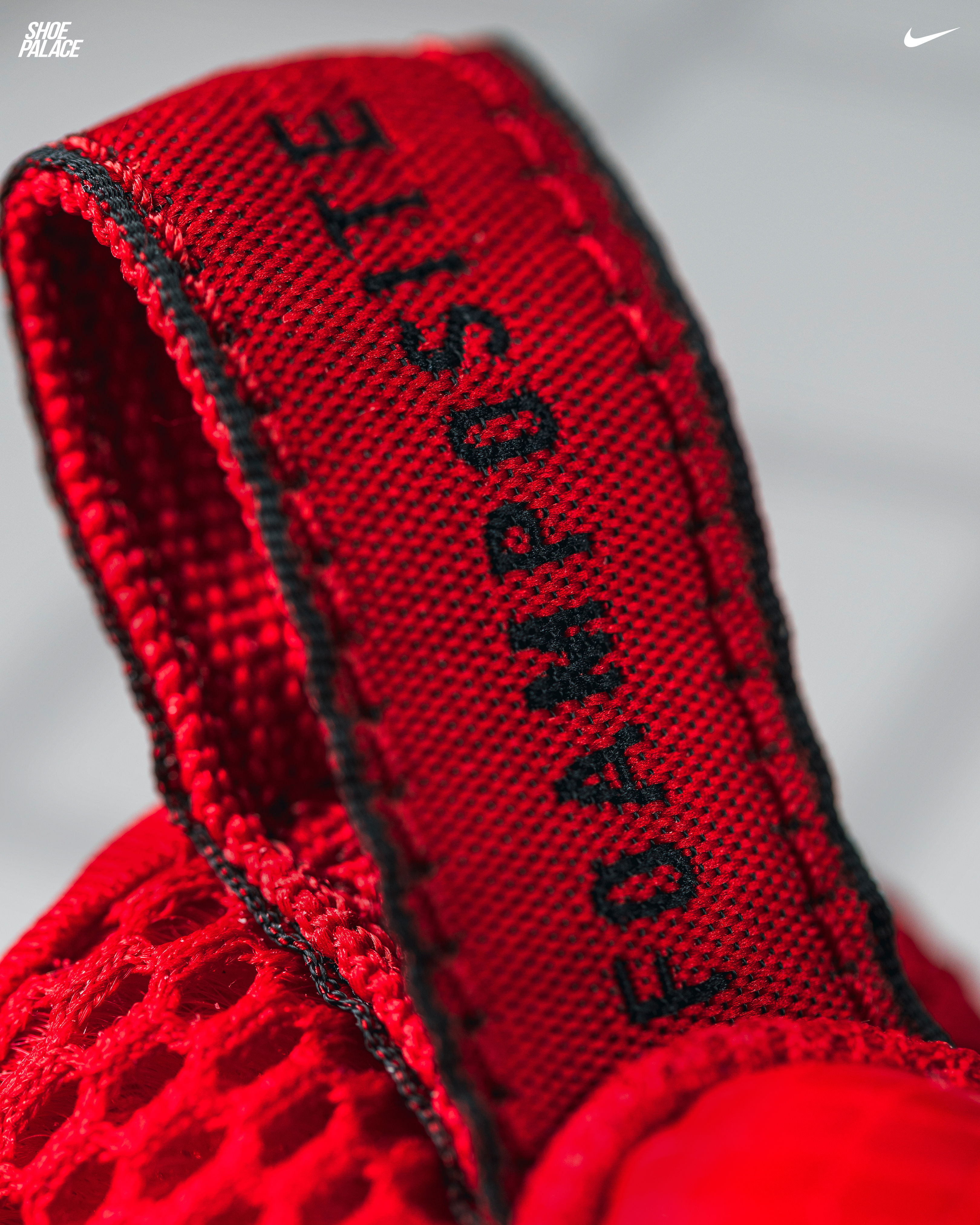 Close-up of a red shoe tag with 