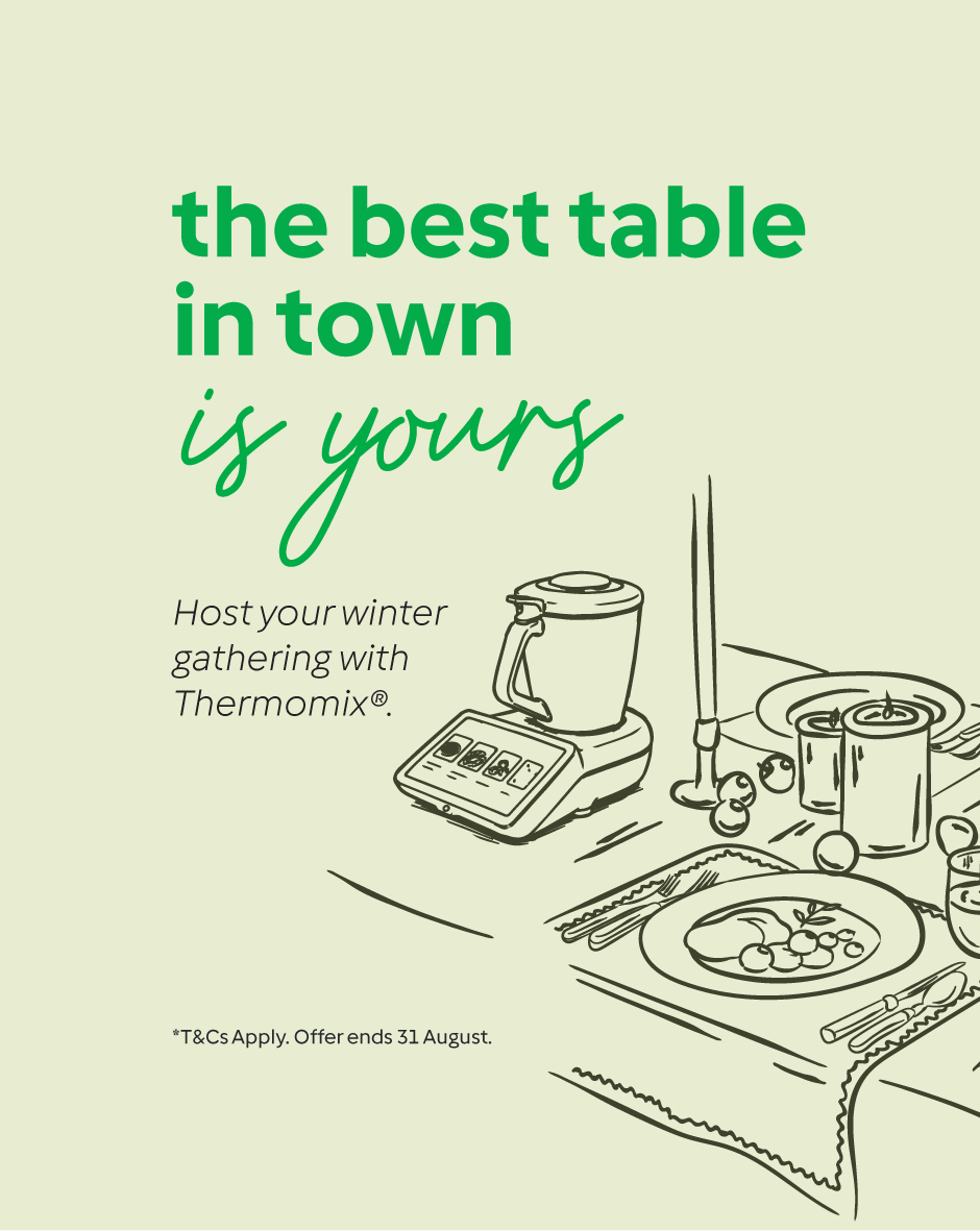 Illustration of a kitchen table set for a gathering with a Thermomix.