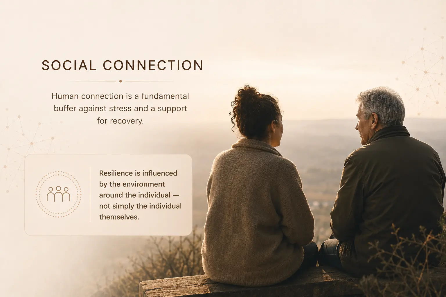 Two people sitting together, discussing social connections and emotional support.