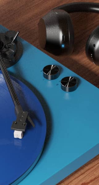 Turntable with blue platter and black headphones on a wooden surface.