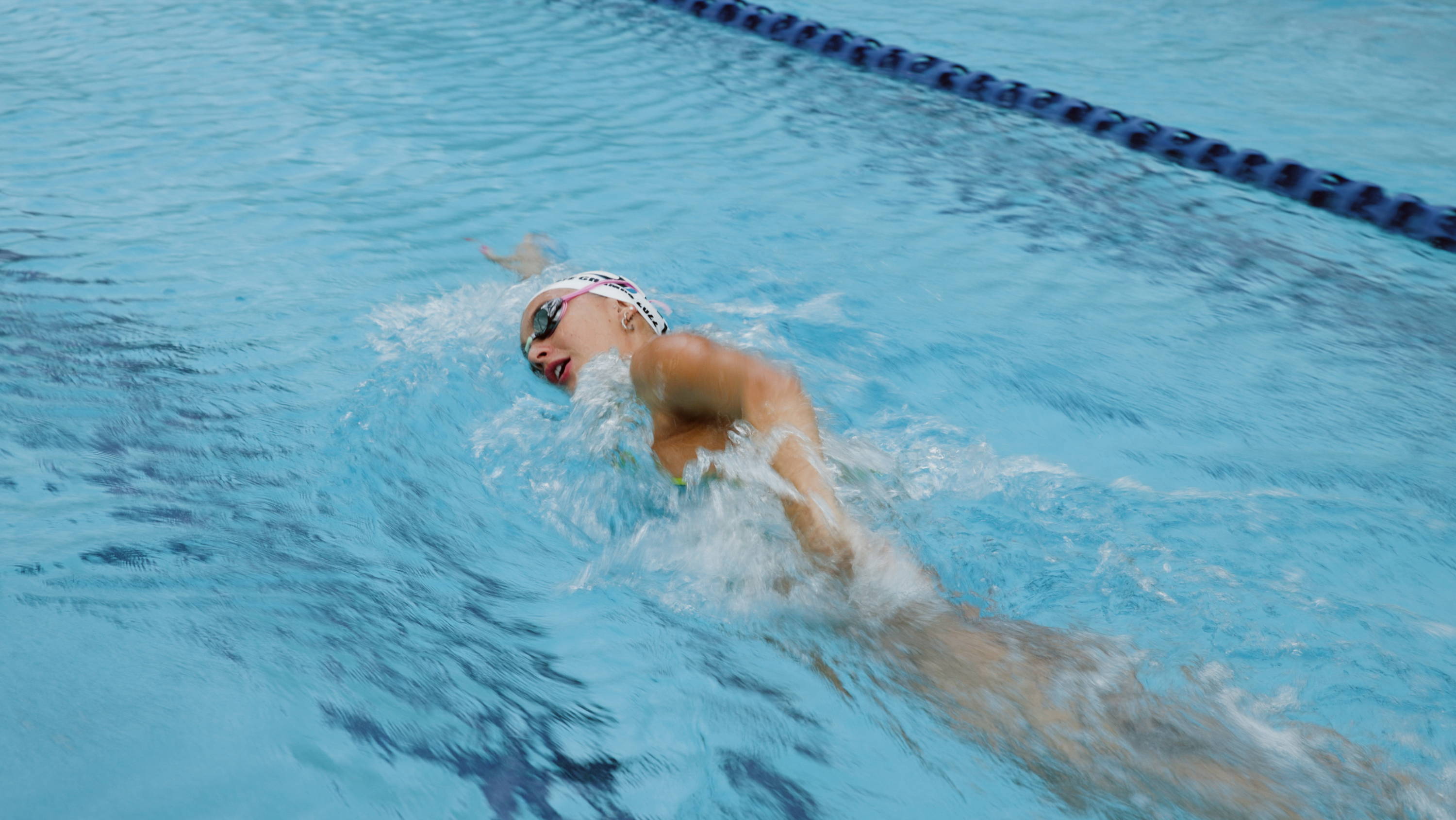 girl swimming in a pool