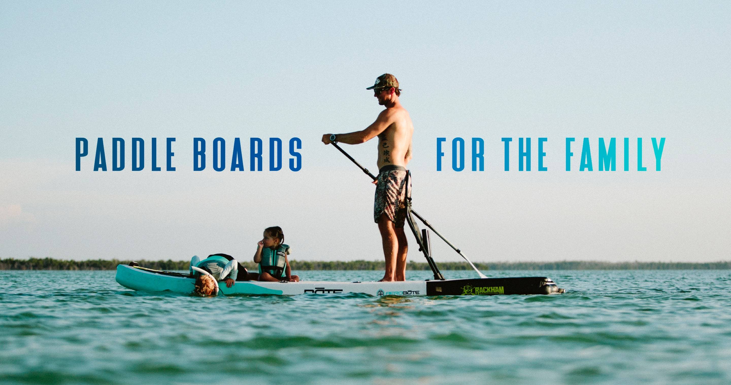 Man on Rackham Aero Paddle Board with kids