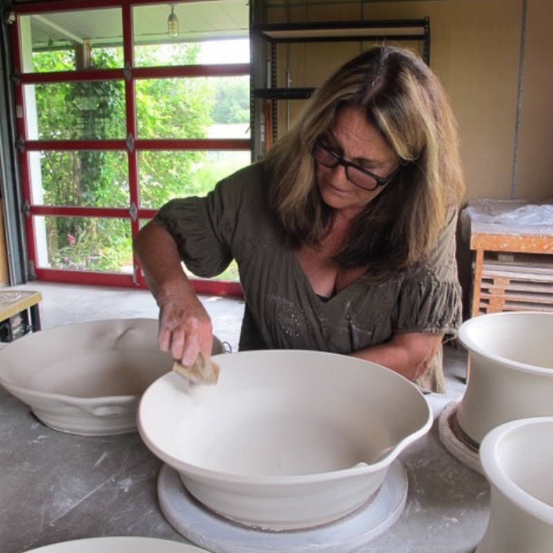Connee Mayeron Cowles making a bowl pottery by Ala von Auersperg