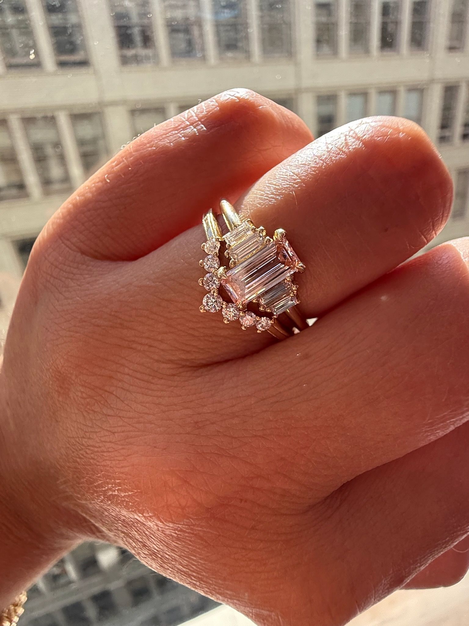 Pink emerald cut lab diamond ring with baguette side stones