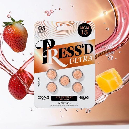 Pressed Ultra packaging with pills, strawberries, and colorful background.