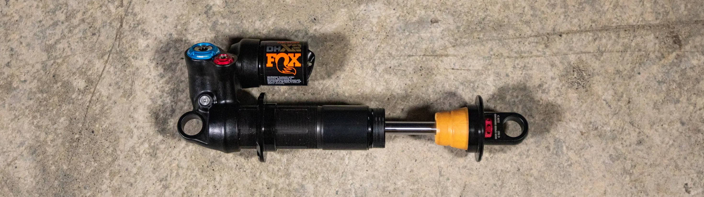 Fox DHX2 mountain bike rear shock with no spring on the floor