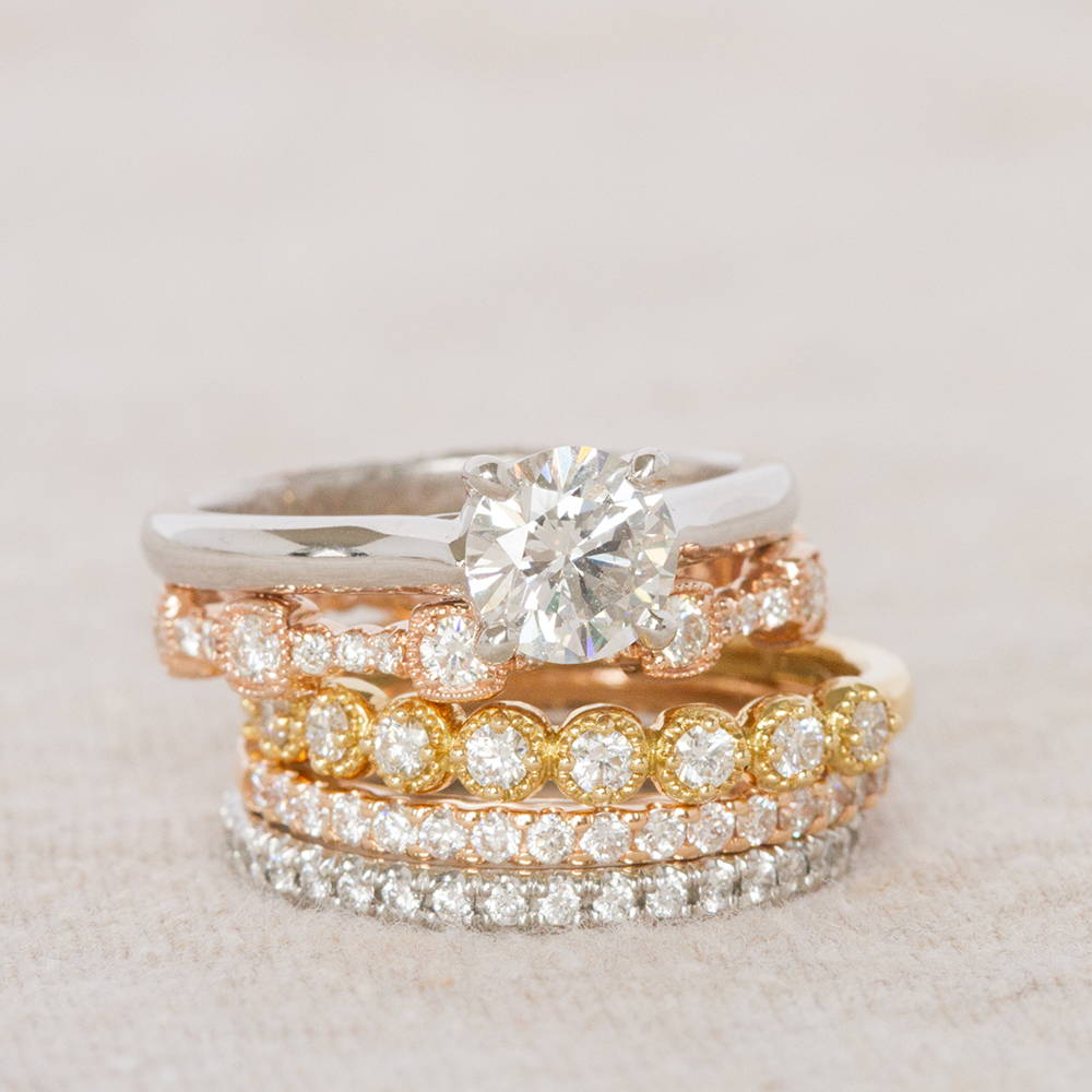 Stack of Engagement Ring and Diamond Bands