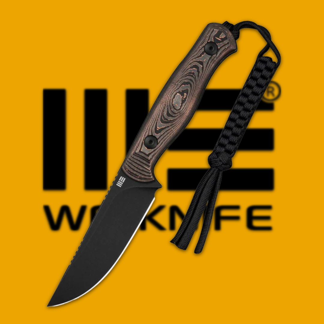 A knife with a black blade on an orange background.