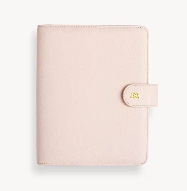 blush pink a5 planner, closed cover with snap closure and gold day designer logo