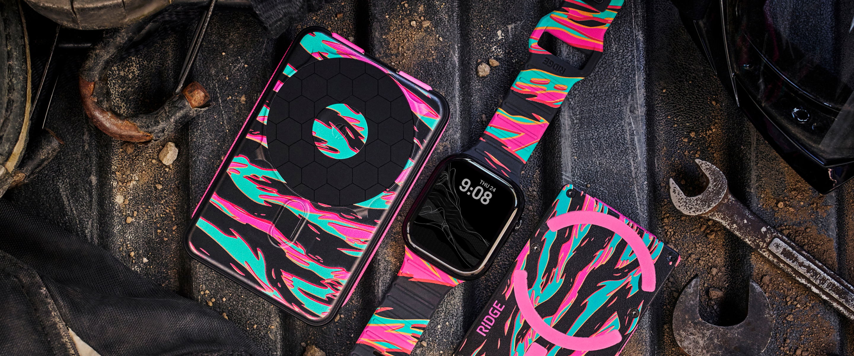 Colorful patterned phone case and strap on a textured background.