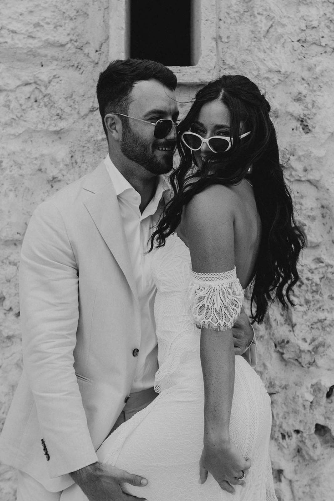 Bride and groom. wearing sunglasses