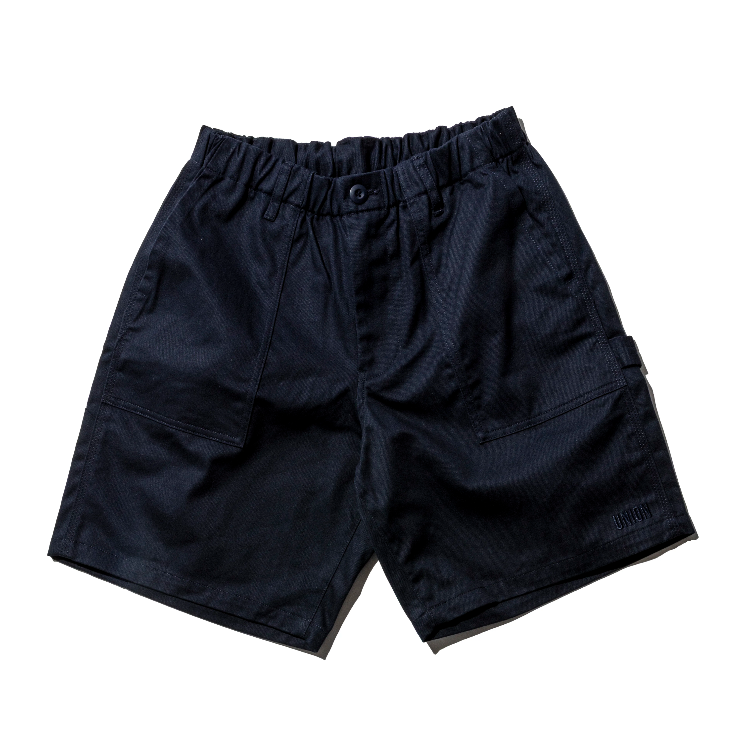 Black shorts with an elastic waistband and side pockets.