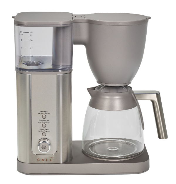 Coffee maker with glass carafe and water reservoir.
