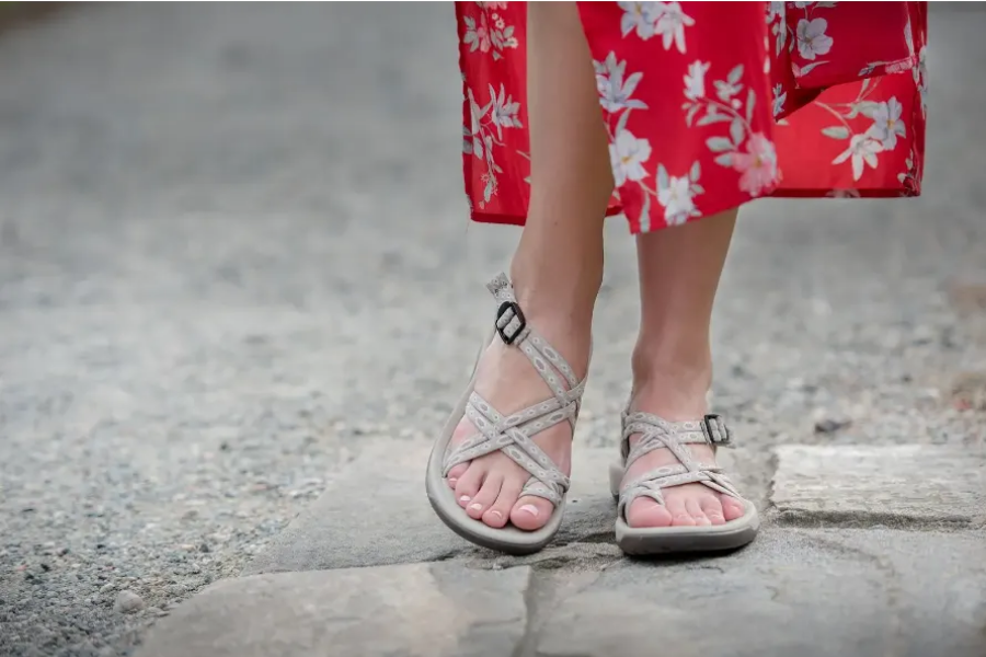 woman wearing sandals with wide toe box