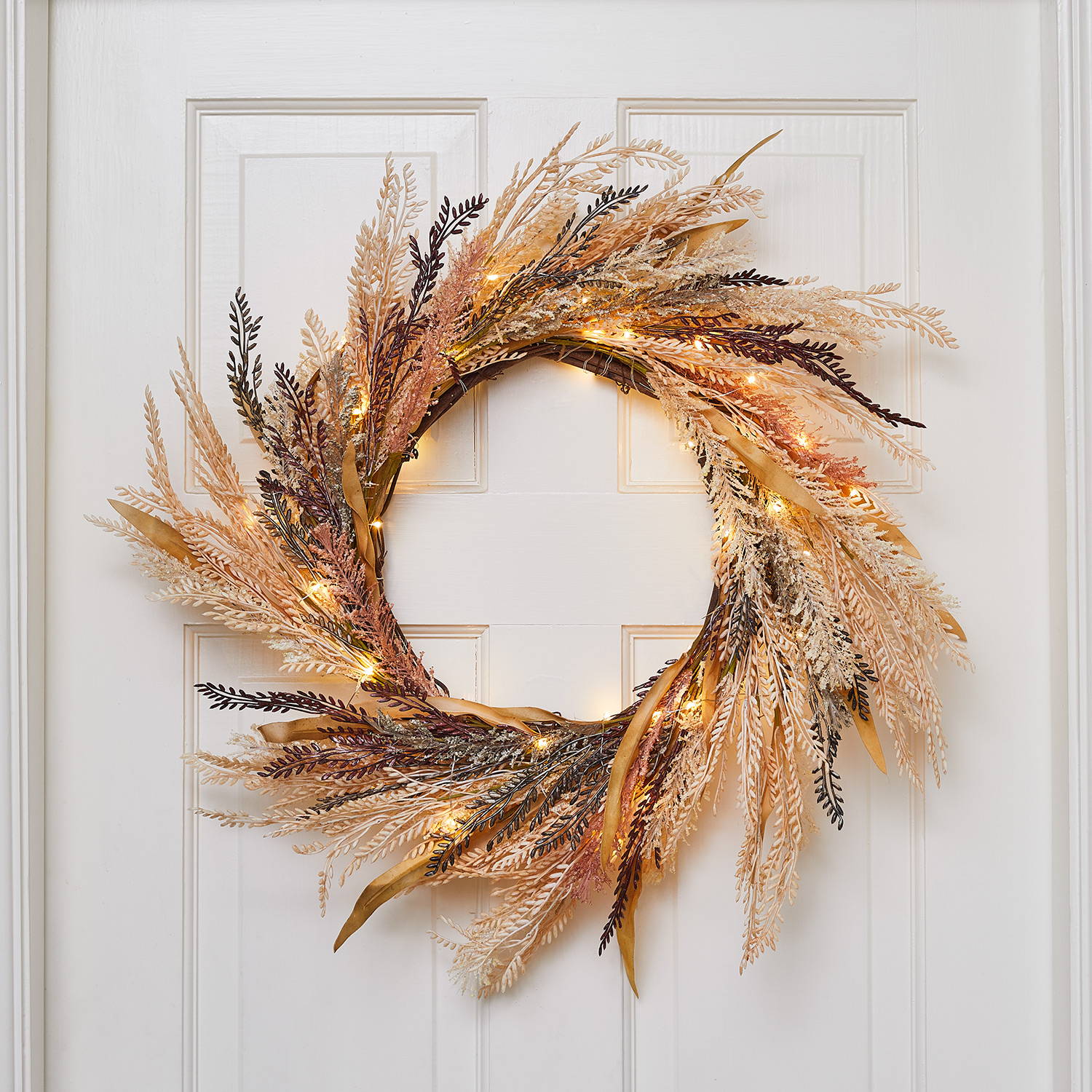 Internal door featuring a wheat wreath entwined in micro lights