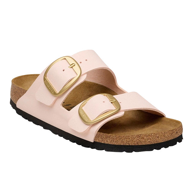 Pink sandals with two gold buckles and a cork sole.